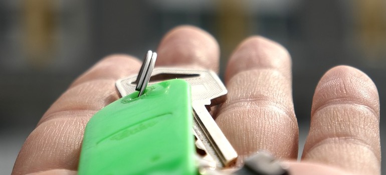 a person holding keys