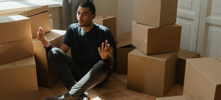 a man relaxing because emergency movers Michigan pay close attention to the safety of his possessions.