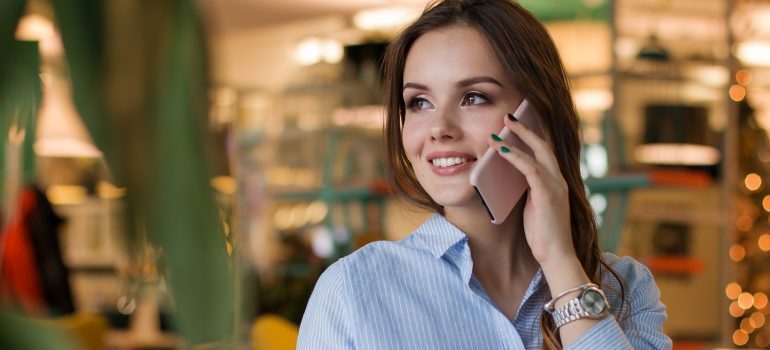 A woman on a phone.