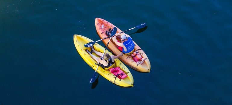 Enjoy paddle boarding on Huron River.