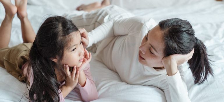 A mother and a daughter talking.