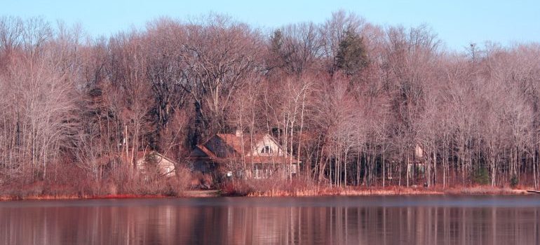 A house in the woods on a lake