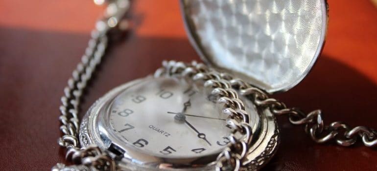 An antique watch as one of the items you should personally transport.