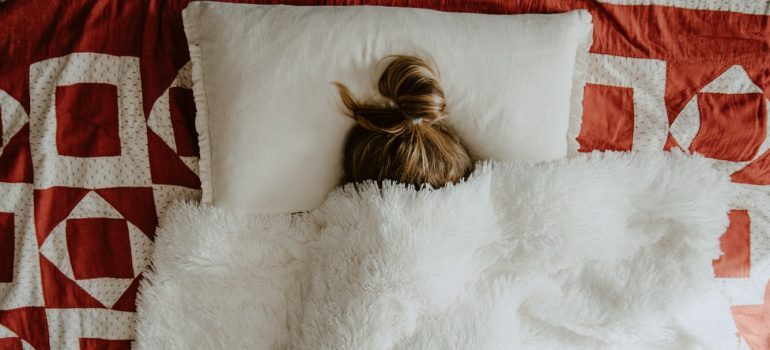 A woman lying in bed