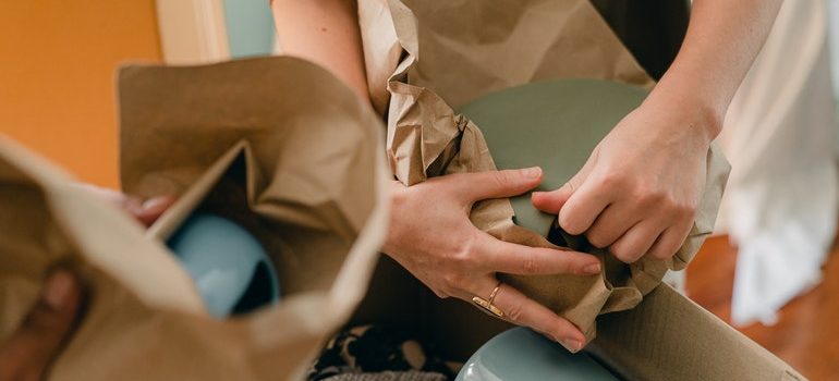 People packing for a move.