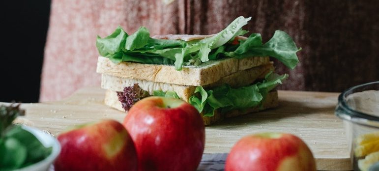 A person making a sandwich